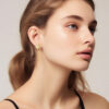 brass knuckle earrings