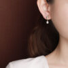 S925 Silver Gold-plated Freshwater Pearl Enamel Feather Earrings