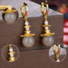 S925 Silver Inlaid Hetian Jade Ancient Building Pearl Earrings