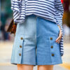 Light-color straight-leg denim shorts with metallic accents
