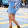 Light-color straight-leg denim shorts with metallic accents