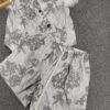 Printed sleeveless V-neck vest and loose casual shorts set