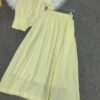 Minimalist high-end V-neck vest and elastic waist A-line skirt set