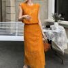 Hollow vest and high-waisted slimming skirt set