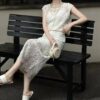 Hollow vest and high-waisted slimming skirt set