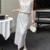 Hollow vest and high-waisted slimming skirt set