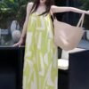 French holiday style draped suspender dress