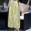 French holiday style draped suspender dress
