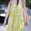 French holiday style draped suspender dress