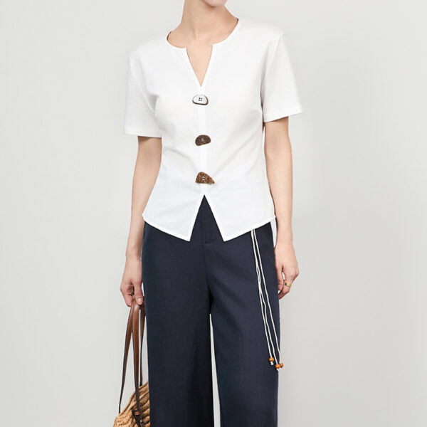 Black and white TENCEL acetate slim waist top with shaped buttons 9