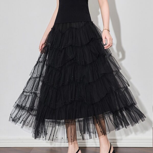 Elegant and flowy beaded mesh skirt