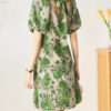 Green V neck puff sleeve floral short dress with tie back 3