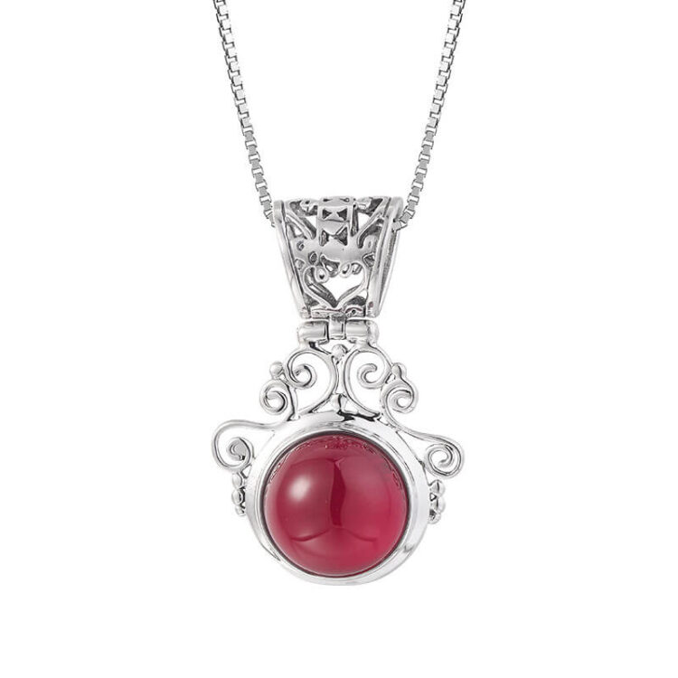 Retro Ethnic Style S925 Silver Hollow Pattern Ruby Pendant
