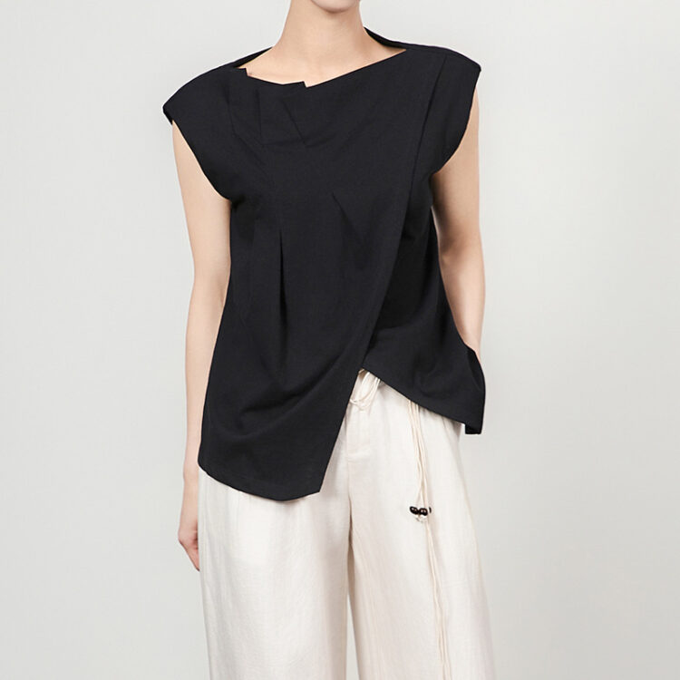 White and black pleated stacked irregular top