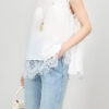 White and black sleeveless lace chiffon top with slit back