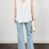 White and black sleeveless lace chiffon top with slit back