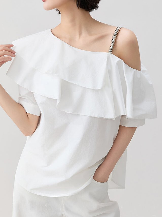Asymmetrical off-shoulder blouse with cascading ruffle detail on one sleeve, unique statement top for women