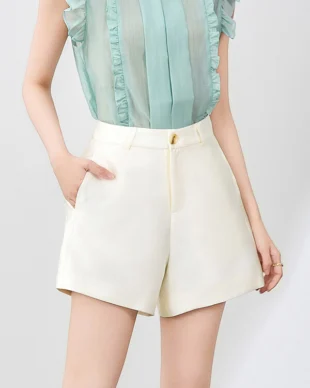 Geometric color block shorts neutral palette outfit