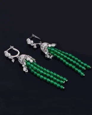 Hand-woven sterling silver tassel earrings with raw chrysoprase gemstones, artisanal hammered texture and oxidized detailing for organic minimalist style.