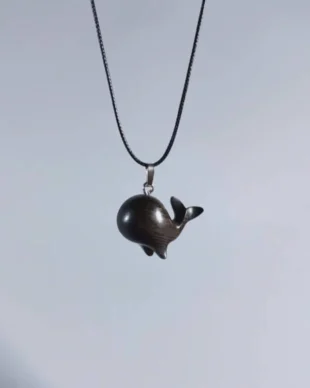 Hand Carved Sandalwood Whale Necklace