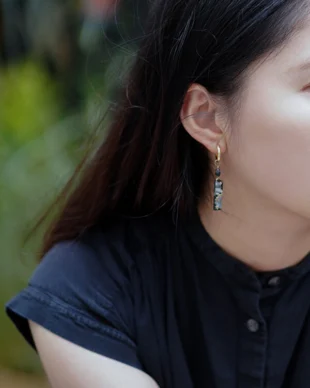 Hypoallergenic black floral earrings for sensitive ears, titanium posts with resin-sealed pansies, minimalist dark academia jewelry