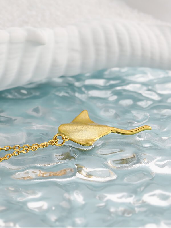 Ghost-net silver stingray pendant - upcycled trawler gear with anti-biofouling coating