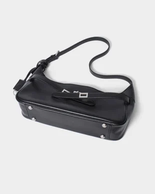 Convertible vintage tote bag for long-haul flights, dual buckle straps as crossbody or backpack